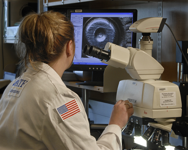 ATF firearms examiner reviews ballistic evidence using the ATF National Integrated Ballistics Information Network.