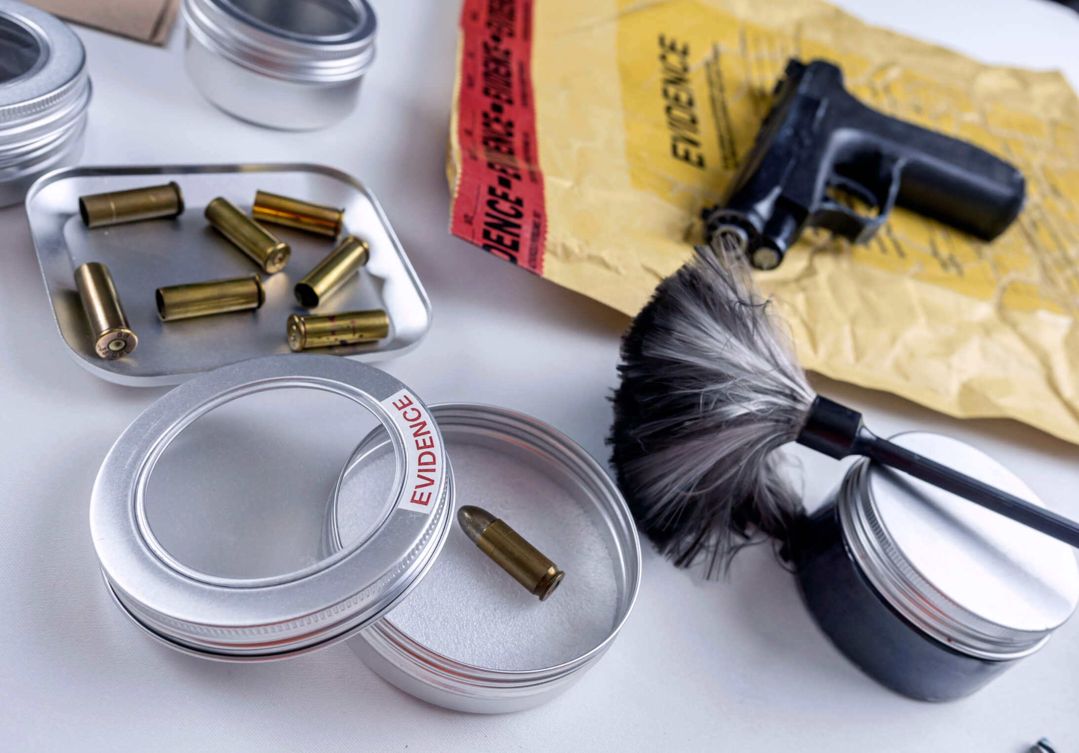 bullet-cap-with-gun-in-ballistic-lab-